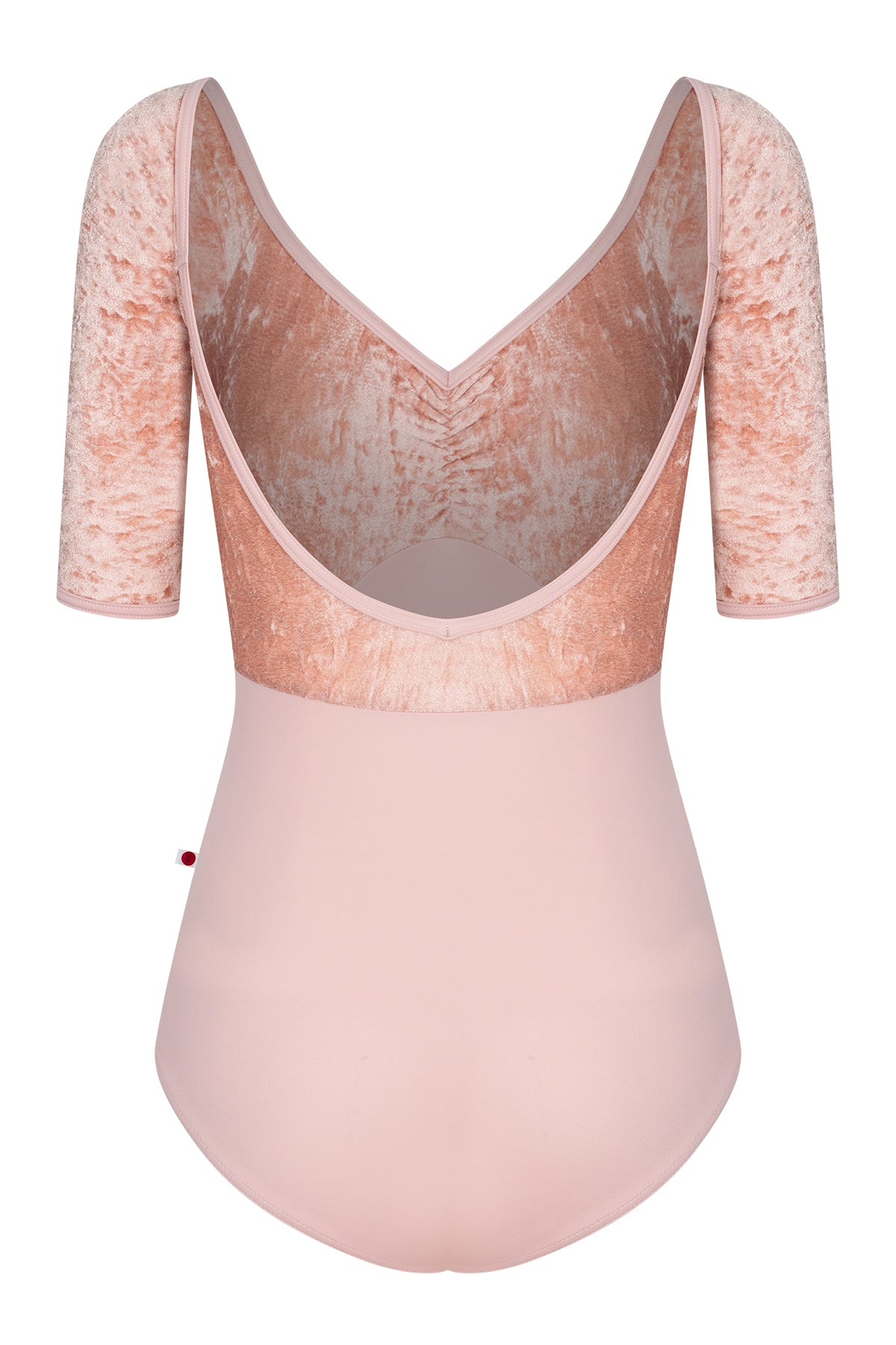 Elli leotard, blush-pink with a crushed-velvet elbow-sleeve bodice and gathered V-neck.