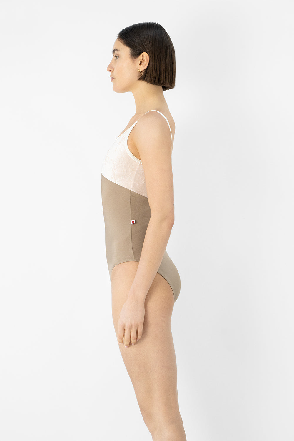 Daria leotard in N-Toffe body color with CV-Misty Rose top color and N-Antique trim color