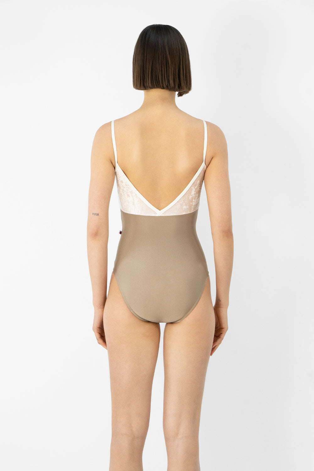 Daria leotard in N-Toffe body color with CV-Misty Rose top color and N-Antique trim color