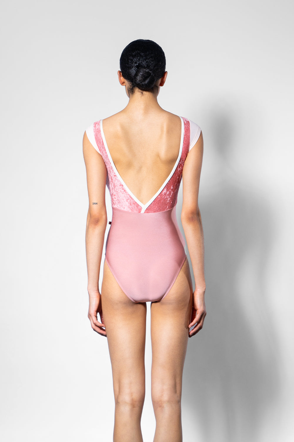 Alicia leotard in N-Antique Rose body color with CV-Romance top color, T-Misty Rose cap sleeve color and N-Antique trim color 