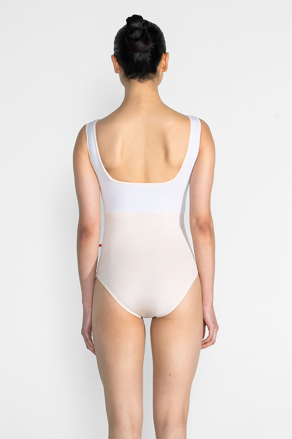 Marieke Duo leotard in T-Misty Rose body color with T-White top color and T-Misty Rose trim color