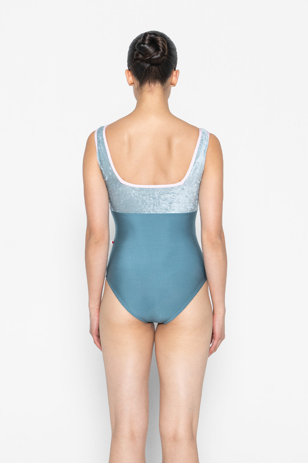 Marieke Duo leotard in N-Frost body color with CV-Ice top color and N-Rose trim color