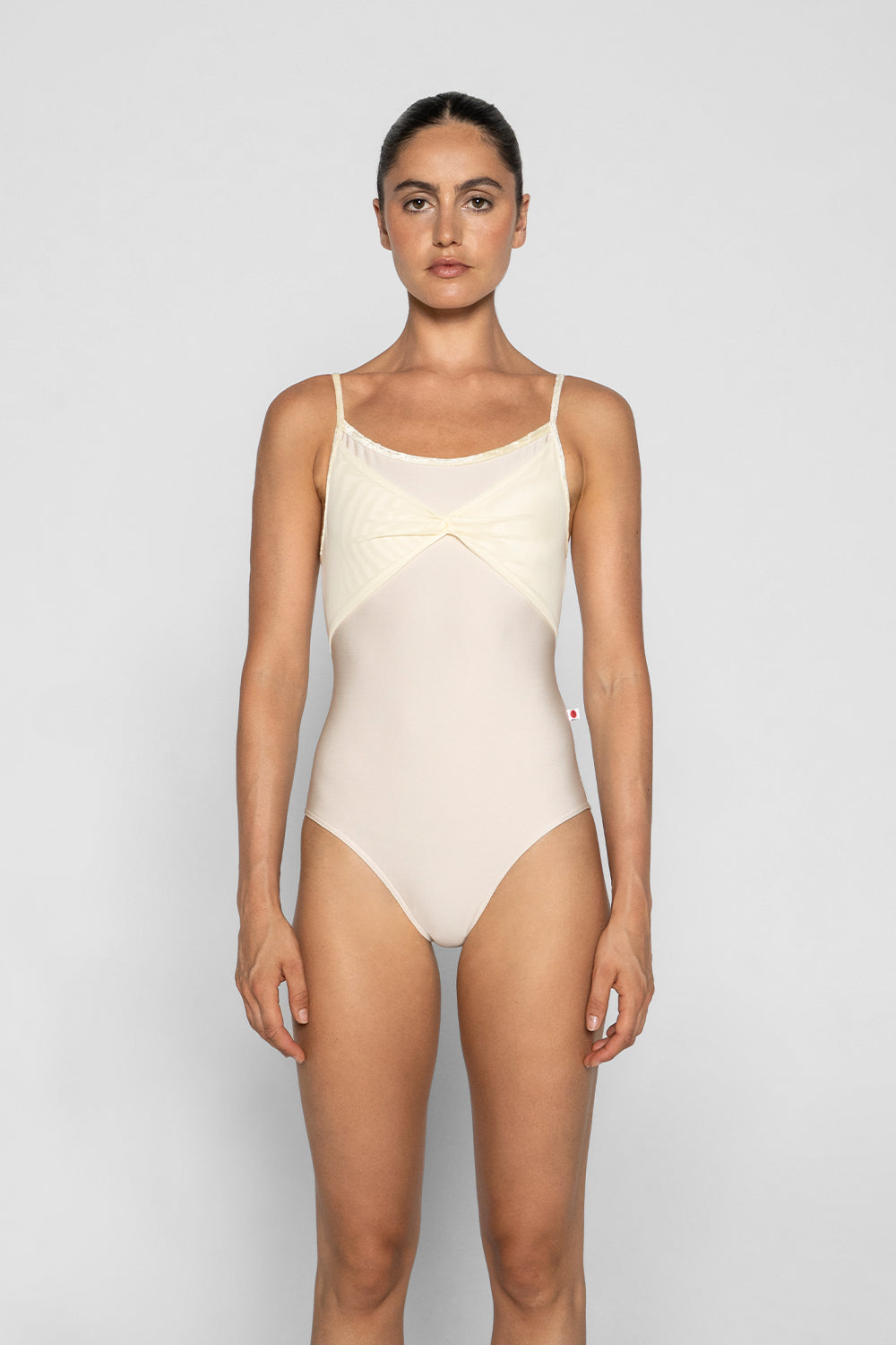 Kathy leotard in N-Pearl body color, CV-Vanilla trim color with Mesh Vanilla overlay