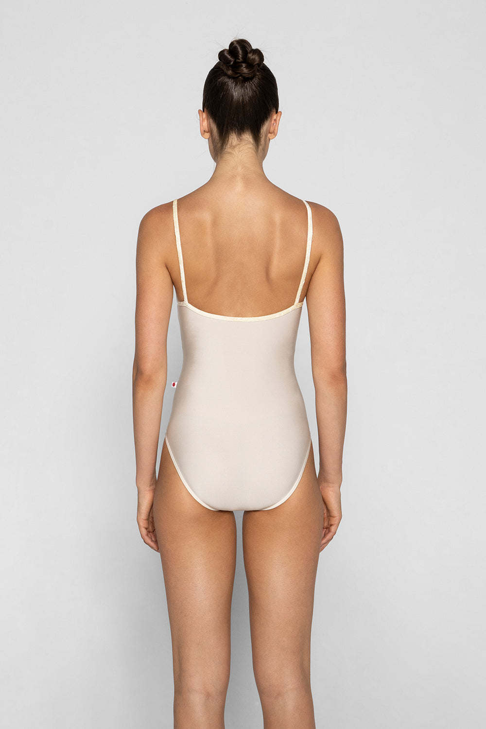 Kathy leotard in N-Pearl body color, CV-Vanilla trim color with Mesh Vanilla overlay