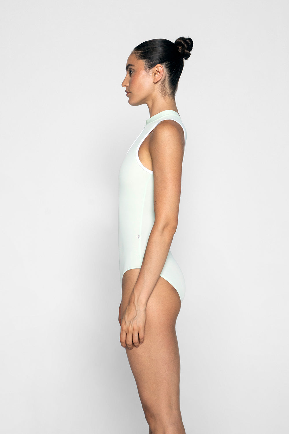 Elise leotard in T-Pistachio body color with T-White trim color