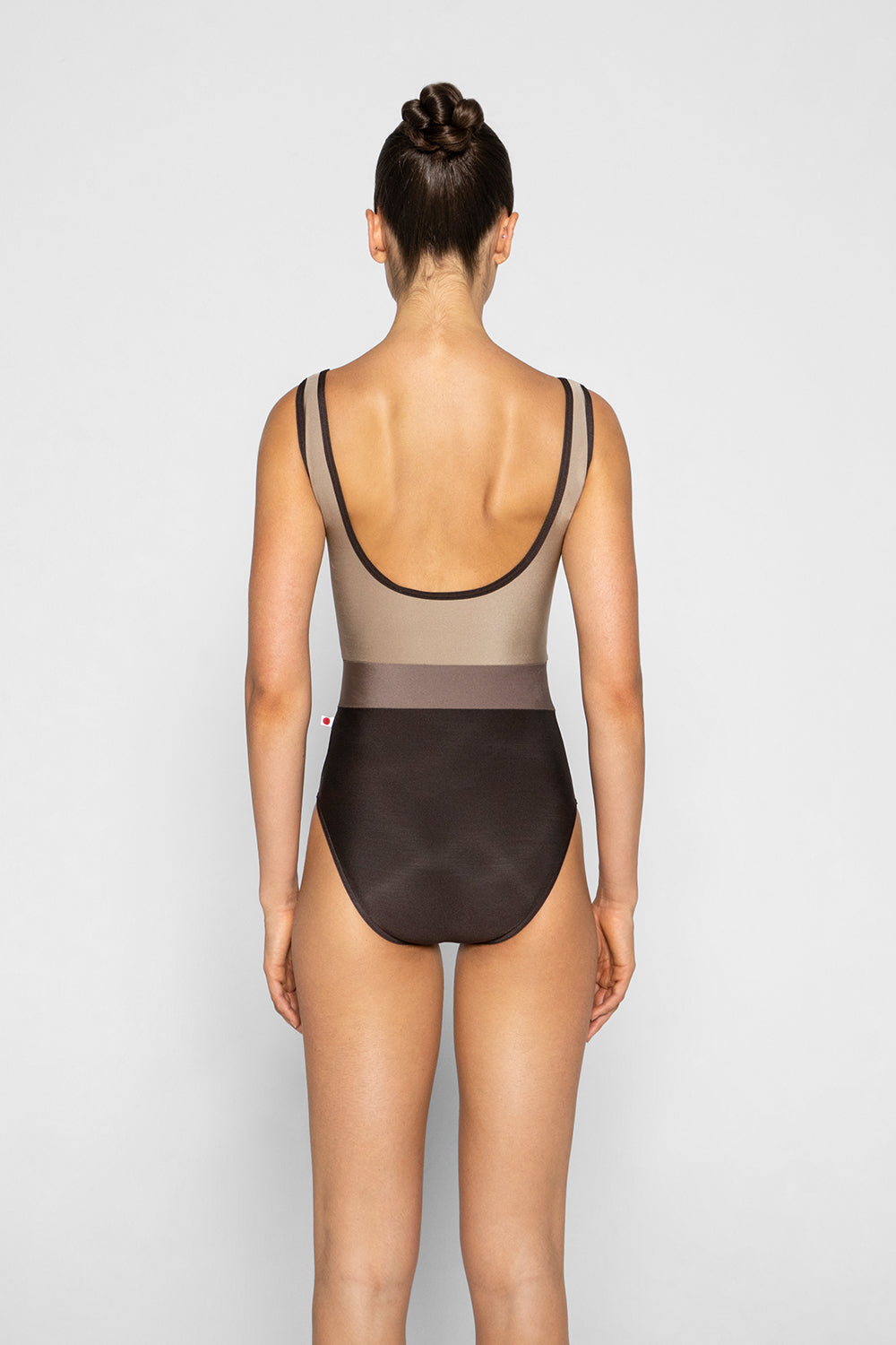 Lucy leotard in N-Espresso body color with N-Toffee top color, N-Star middle band color and N-Espresso trim color