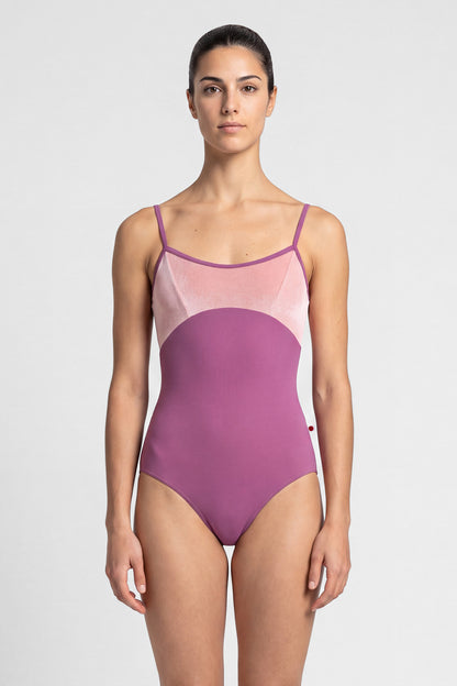AI-generated model. Denise leotard, pink crushed-velvet bodice and a magenta body, scoop neck with thin straps.