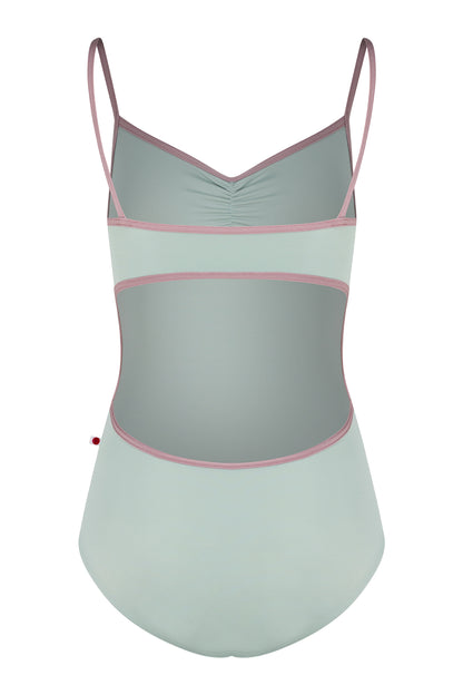 Kiki leotard, pale sage-green with a ruched V-neck and dusty-pink strap trim.