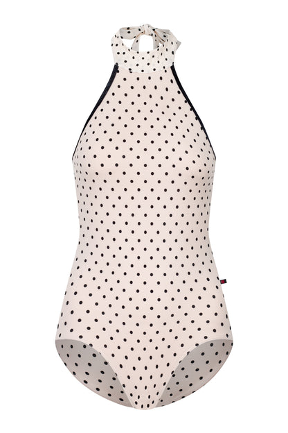 Kelly leotard, all-over T-Lunares Cream polka-dot with a black-trimmed high halter neck and open sides.