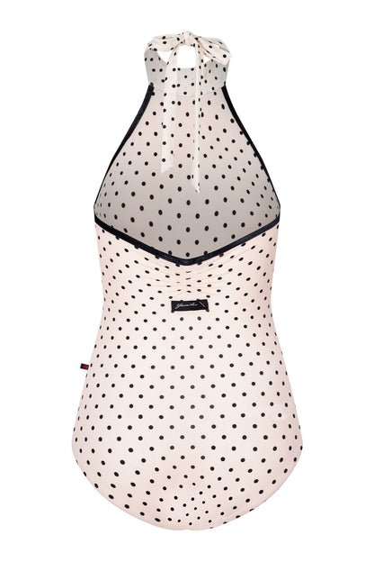 Kelly leotard, all-over T-Lunares Cream polka-dot with a black-trimmed high halter neck and open sides.