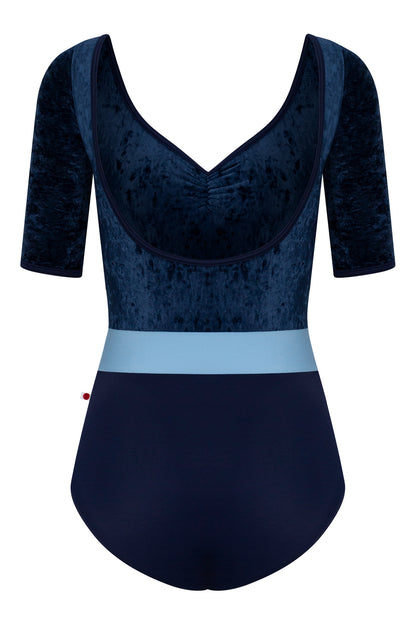Lucy leotard, navy crushed-velvet elbow-sleeve bodice with a light-blue waistband and a navy body, V-neck.