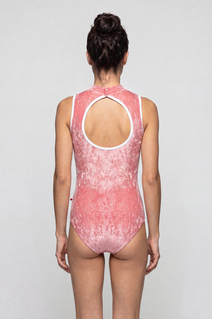 AI-generated model. Elise leotard, dusty-rose crushed velvet with a high neck and teardrop keyhole, white trim.