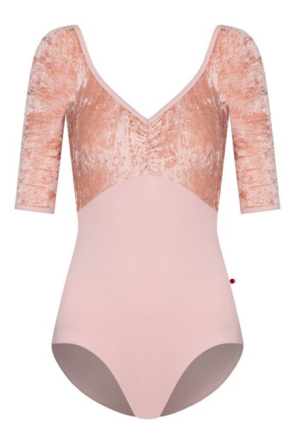 Elli leotard, blush-pink with a crushed-velvet elbow-sleeve bodice and gathered V-neck.