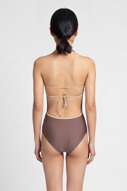 AI-generated model. Kate leotard, mauve-taupe with a scoop neckline and strappy back.