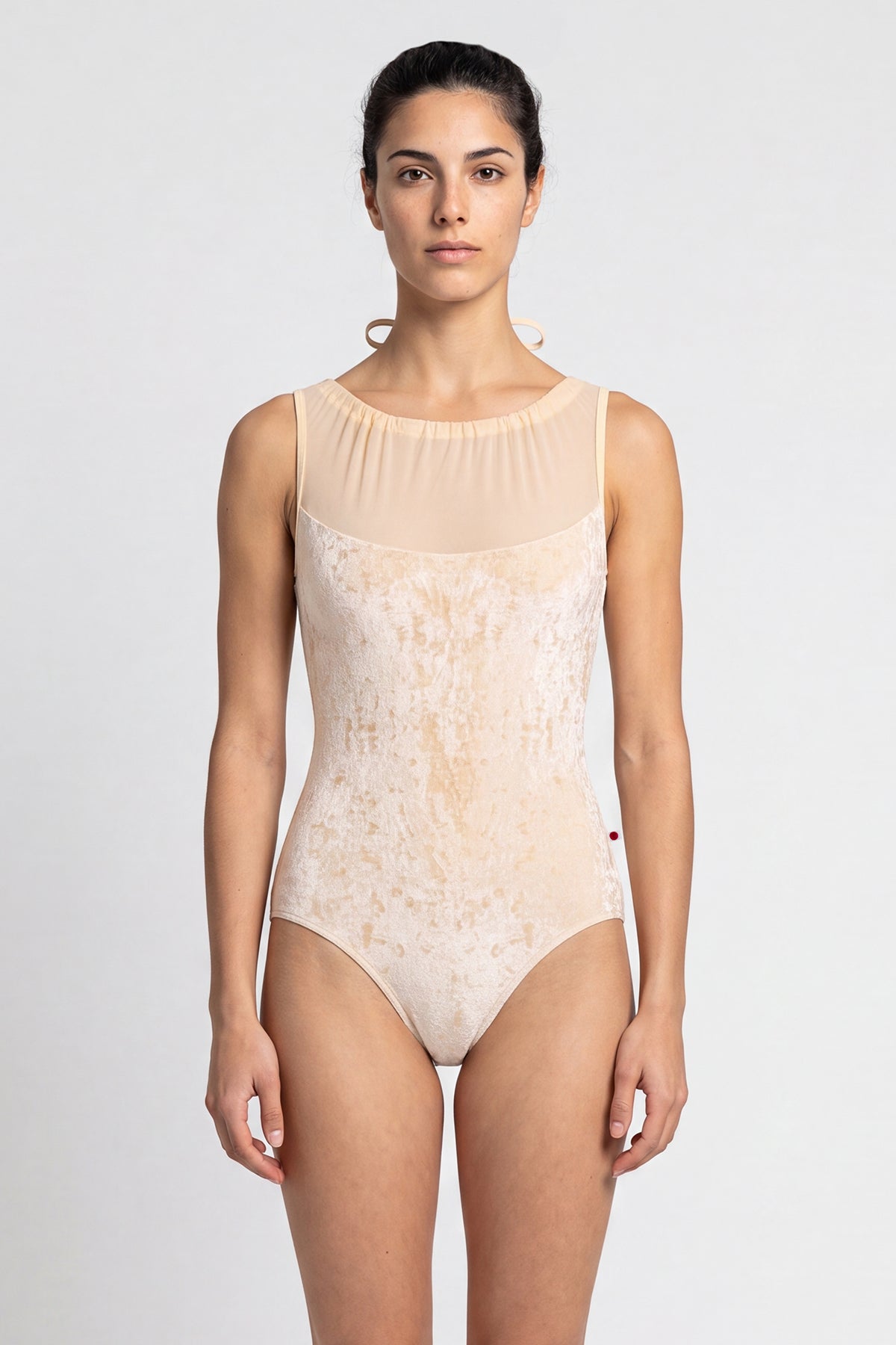 AI-generated model. Paris leotard in Vanilla, cream velvet with a gathered mesh boat neckline. 
