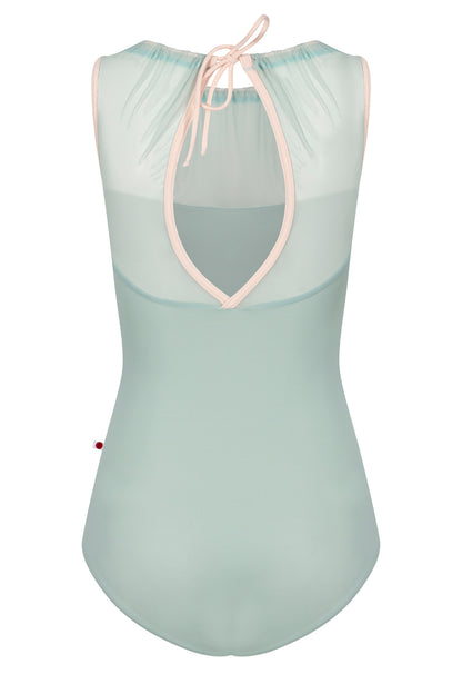 Paris leotard in Whisper, pale sage-green with a sheer gathered mesh boat neckline and pink straps. 