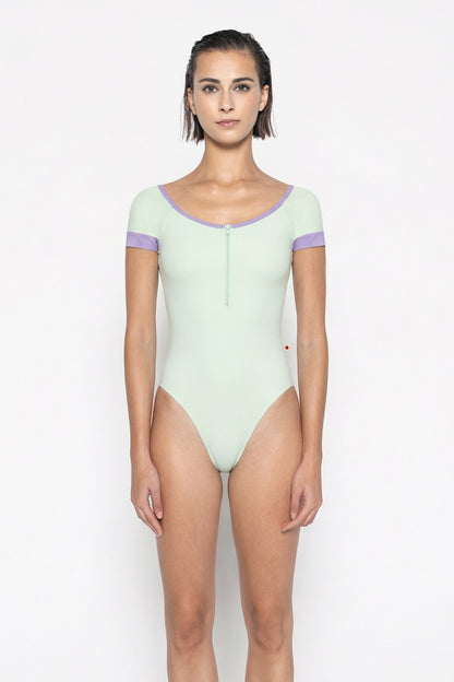 Chloe leotard in T-Pistachio body color with Mesh White top color, T-Pistachio sleeves and zipper & N-Poem trim color