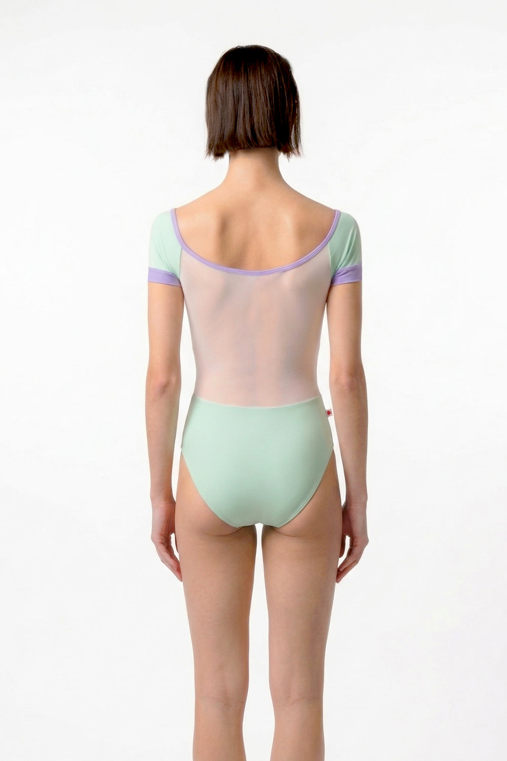 Chloe leotard in T-Pistachio body color with Mesh White top color, T-Pistachio sleeves and zipper & N-Poem trim color