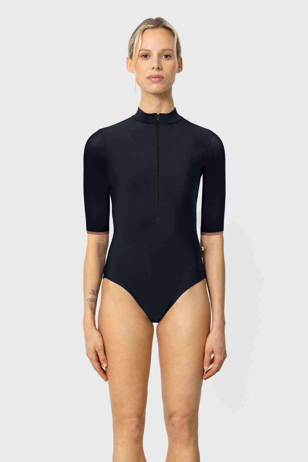 Jessica leotard in N-Black body color with T-Sepia trim color and N-Black zipper & half sleeves