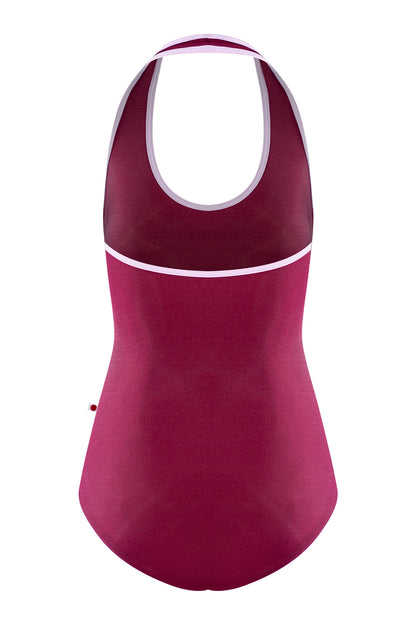 Jaione leotard, burgundy with a pale-pink halter neckline and open sides.