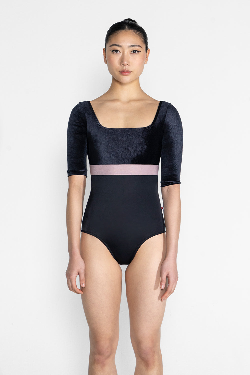 Marieke Variation 1 leotard in T-Black body color with V-Black top & trim color and N-Magic middle band color. V-Black half sleeves